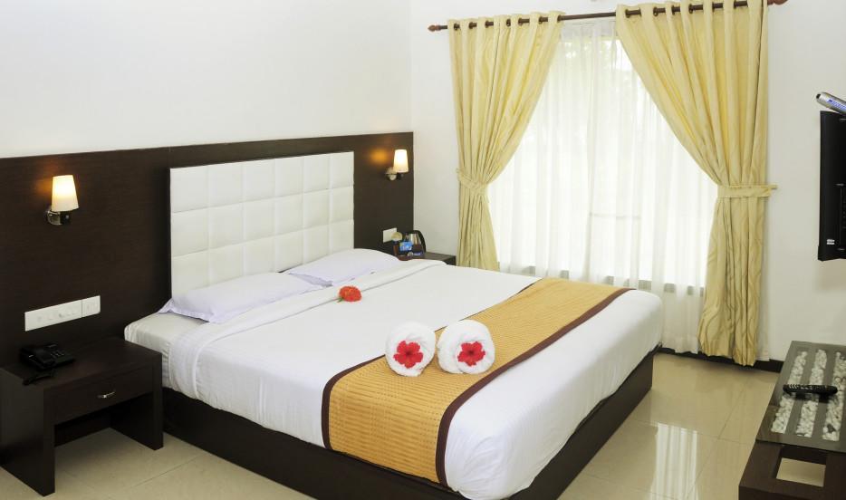 Leisure Vacations Gold Field Lake Resort, Кумараком Номер фото